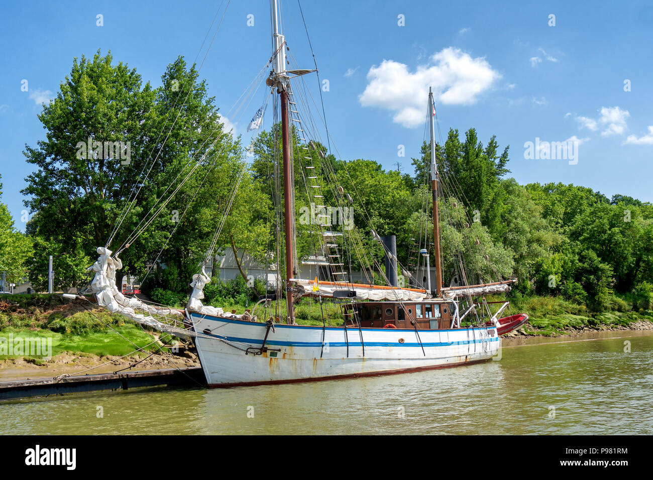 an old sailing boat moored on the river Stock Photo - Alamy