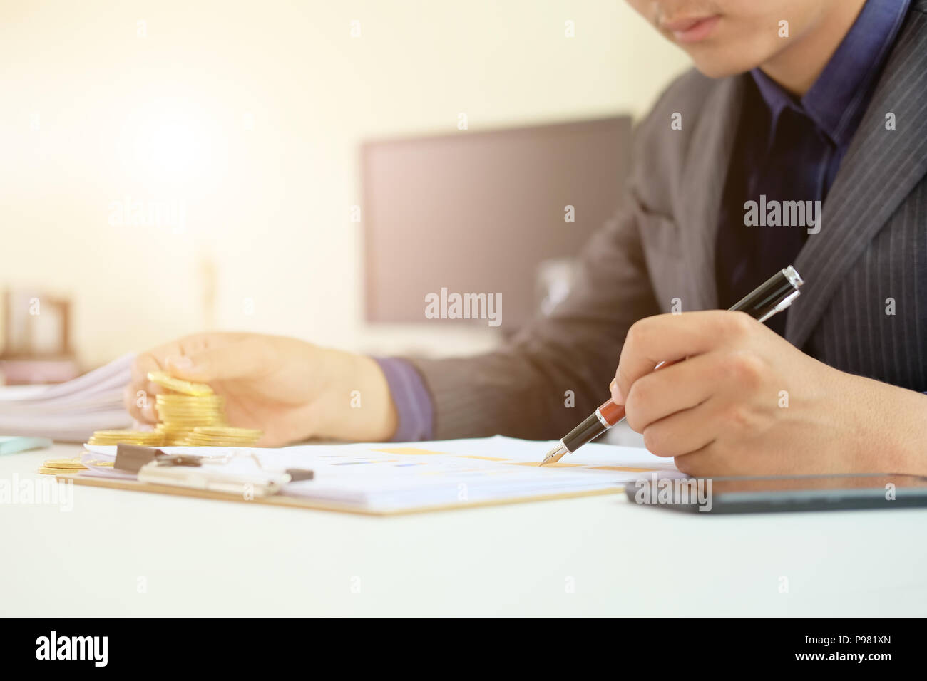 Man working on spreadsheet document financial data,Certified public