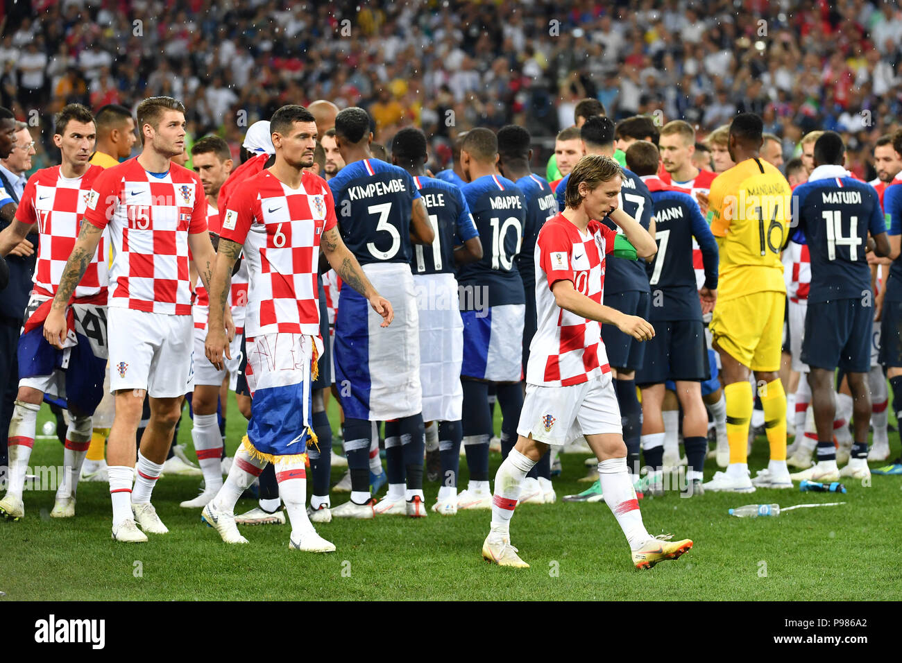 Croatian players at the award ceremony, Victory Ceremony. Disappointment, frustrated, disappointed, frustrated, dejected, Luka MODRIC (CRO), Dejan LOVREN (CRO). Duje CALETA-CAR (CRO). Mario MANDZUKIC (CRO). France (FRA) - Croatia (CRO) 4-2, Final, Game 64, on 15.07.2018 in Moscow; Luzhniki Stadium. Football World Cup 2018 in Russia from 14.06. - 15.07.2018. | usage worldwide Stock Photo