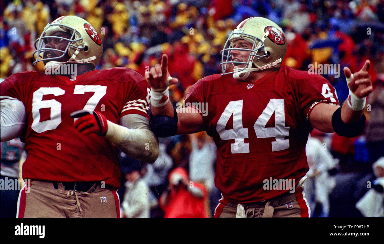 San Francisco, California, USA. 6th Dec, 1992. San Francisco 49ers vs. Miami  Dolphins at Candlestick Park Sunday, December 6, 1992. 49ers Beat Dolphins  27-3. 49ers defender gang up on Dolphins running back