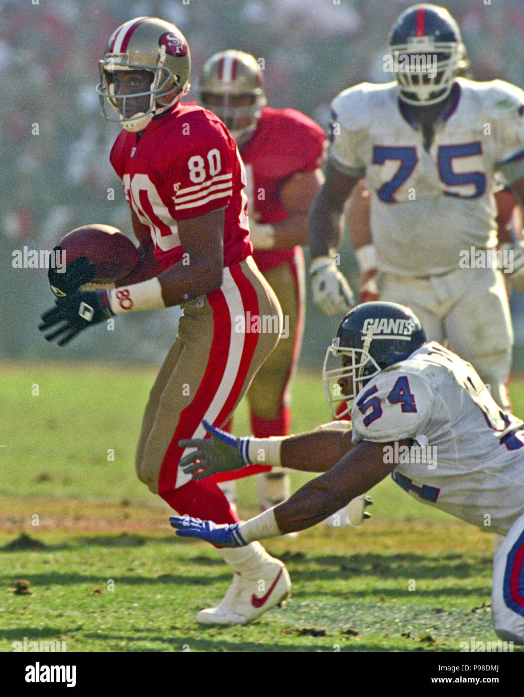 San Francisco, California, USA. 3rd Dec, 1990. San Francisco 49ers vs New  York Giants at Candlestick Park Monday, December 3, 1990. 49ers beat Giants  7-3. 49ers quarterback Joe Montana (16) passing. Credit: