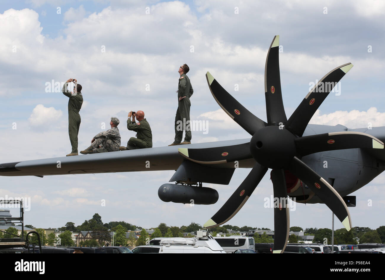 Farnborough International Airshow 2018, Farnborough, Surrey, UK. 16th July 2018. US airmen watch the flying displays. Credit: Allan Staley/Alamy Live News Stock Photo