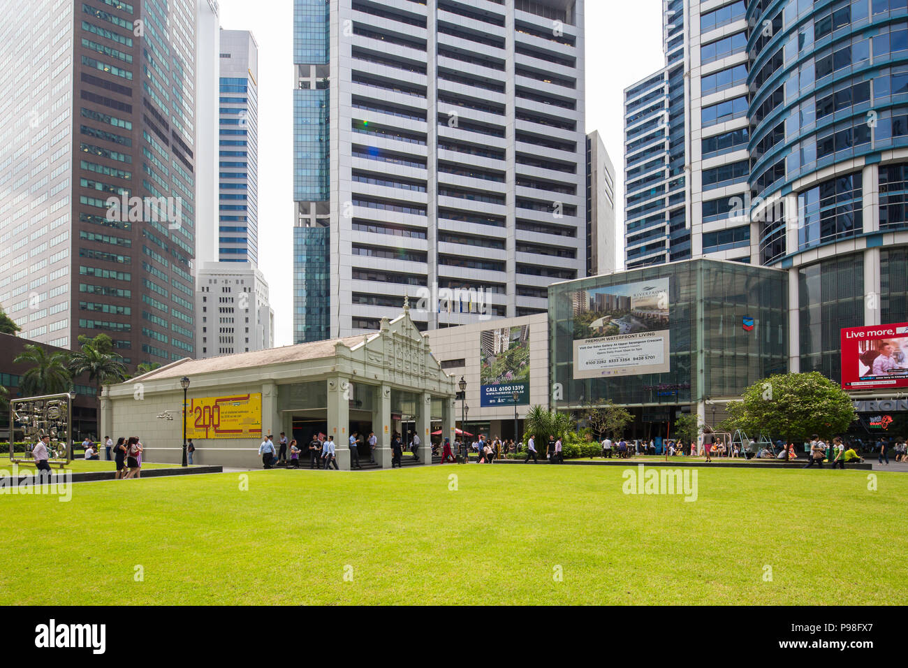 View of Raffles Place MRT station in Singapore Central Business District with the commercial buildings in the background. Stock Photo