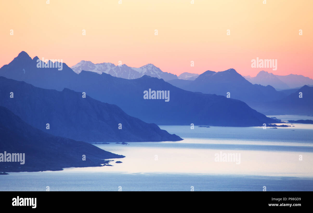 Abstract mountain sunset with ocen Stock Photo