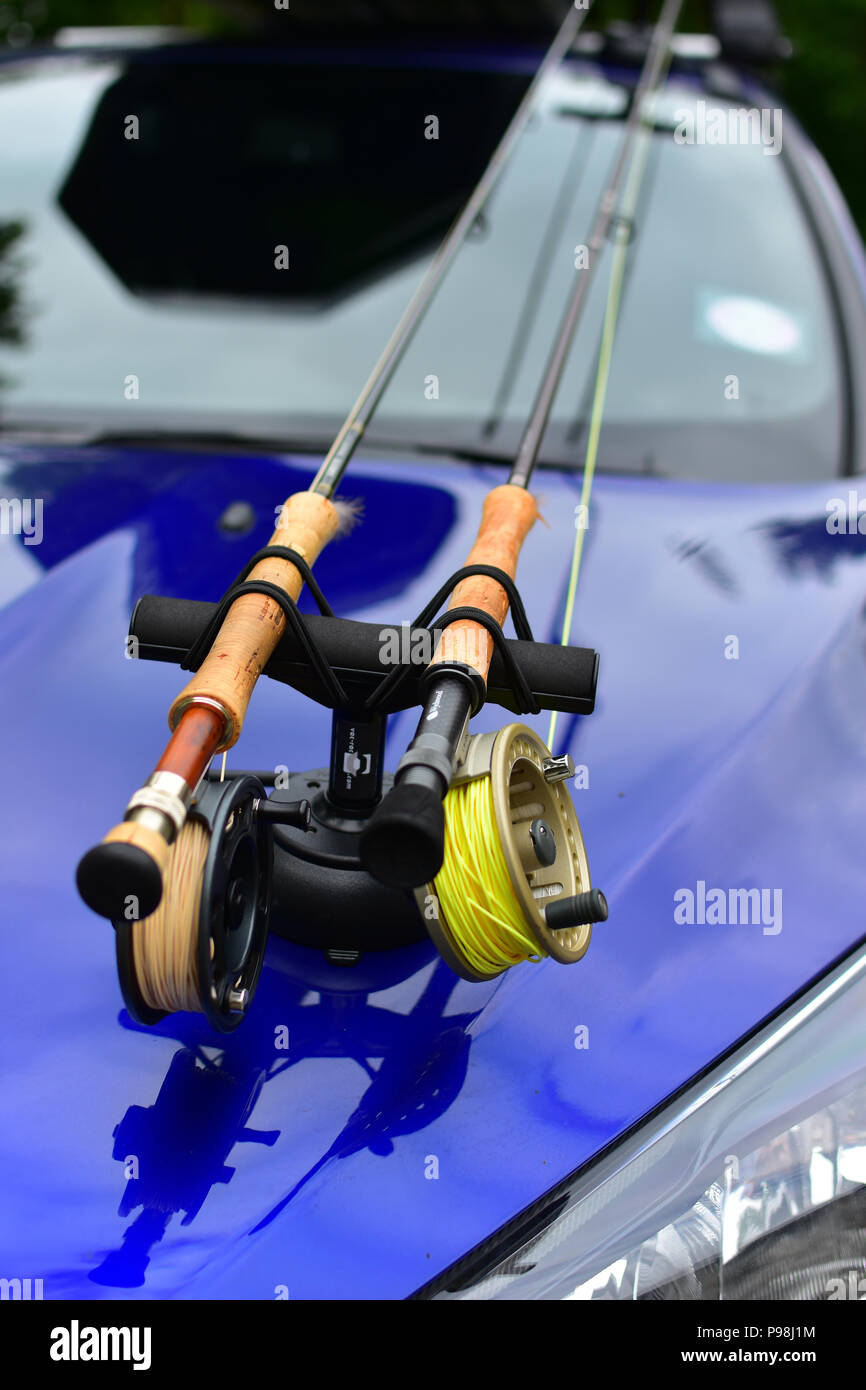 Fishing rods on a car Stock Photo