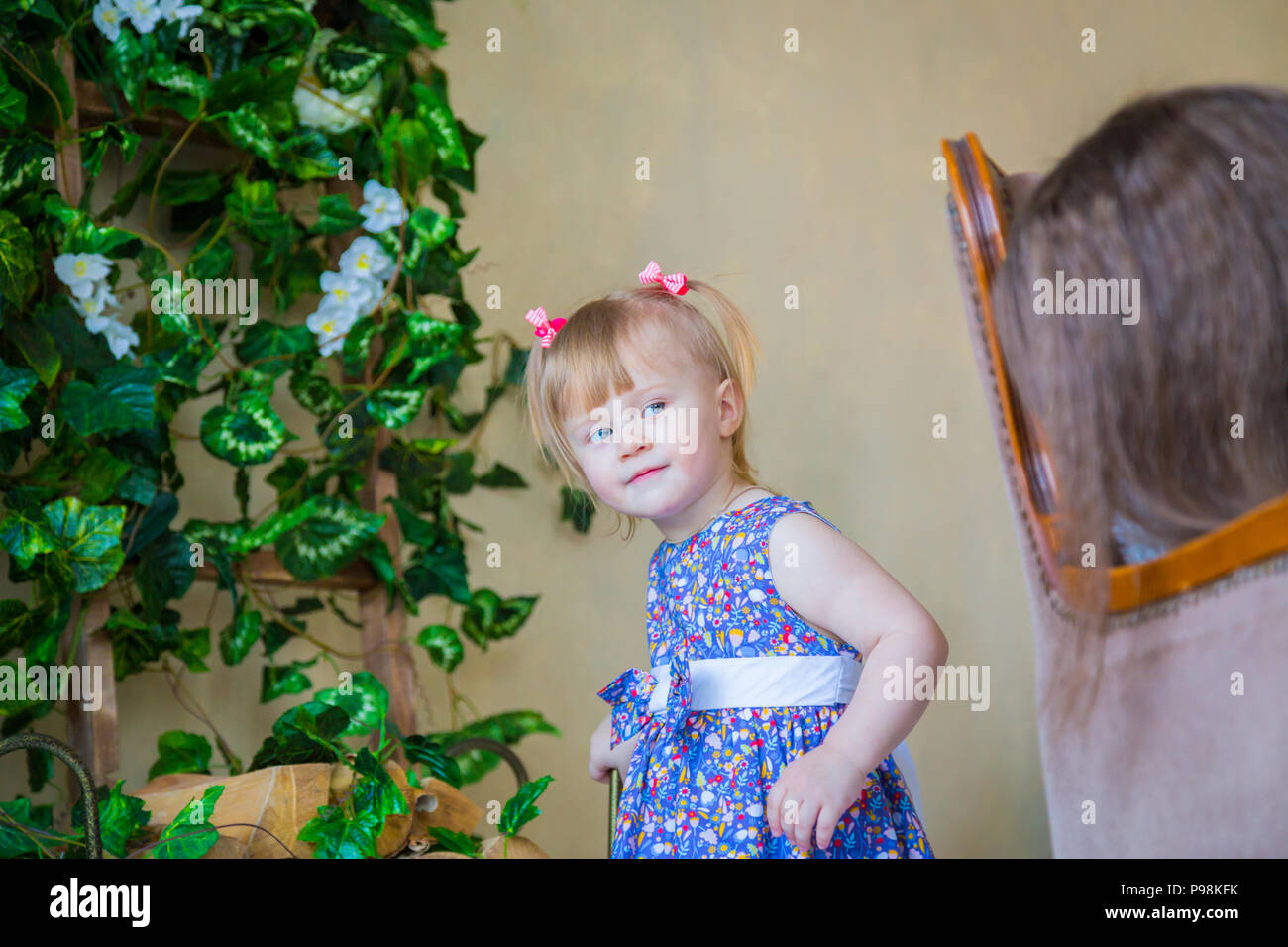 Portrait of funny little girl at home Stock Photo