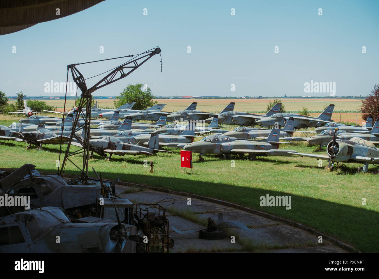 Neglected Yugoslav-era aircraft on display in the summer sun outside the Aeronautical Museum Belgrade, Serbia Stock Photo