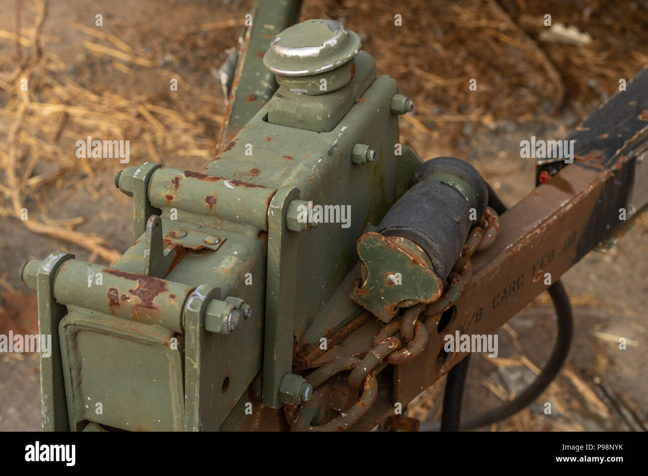 industrial military hitch with lots of rust military green Stock Photo