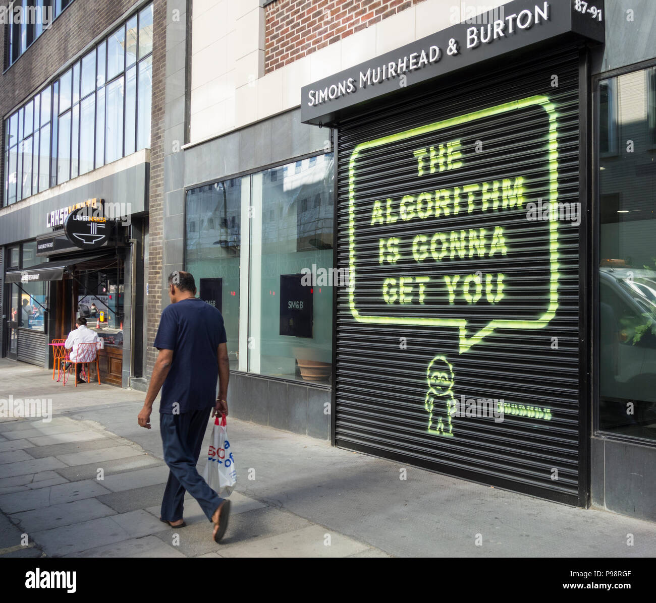 The algorithm is gonna get you by Subdude, opposite Facebook's Rathbone Square HQ in London, UK Stock Photo