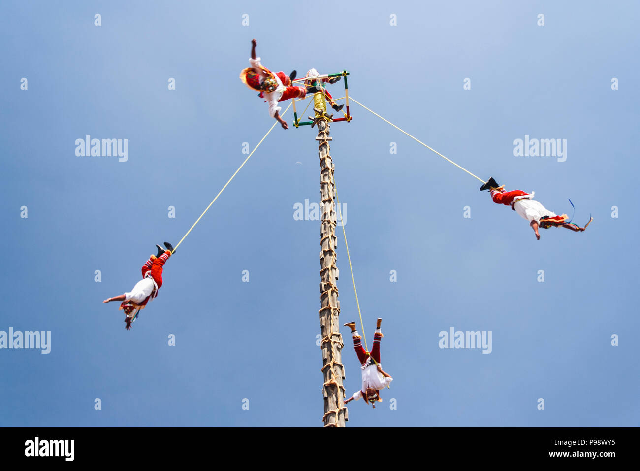 Teotihuacan, Mexico : Totonac people dressed in traditional clothes performing the Voladores or Flying Men ceremony named an Intangible cultural herit Stock Photo
