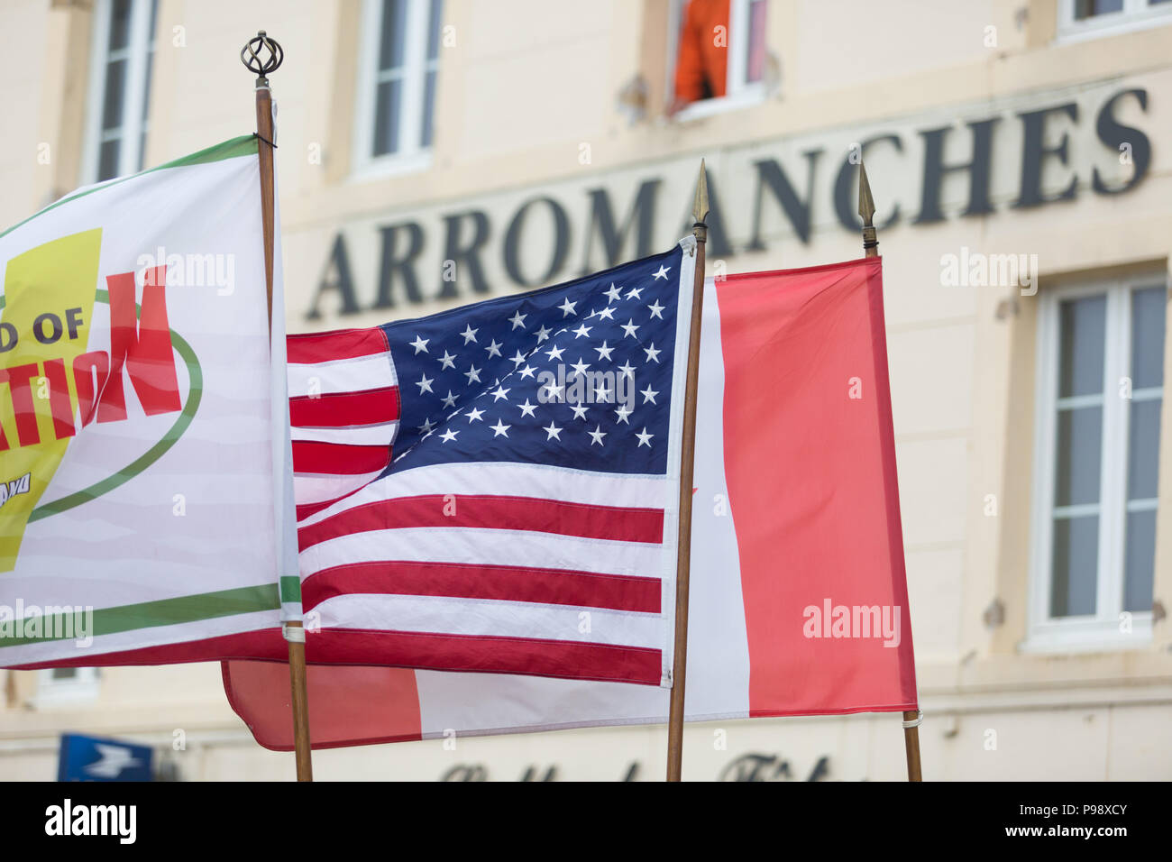 US American flags flying in Arromanches, Normandy, France Stock Photo