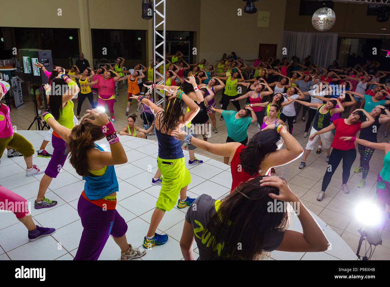 indaiatuba, July 24, 2018, unidentified people, wearing colorful clothes, stretching on a stage in an unidentified location after a zumba class Stock Photo