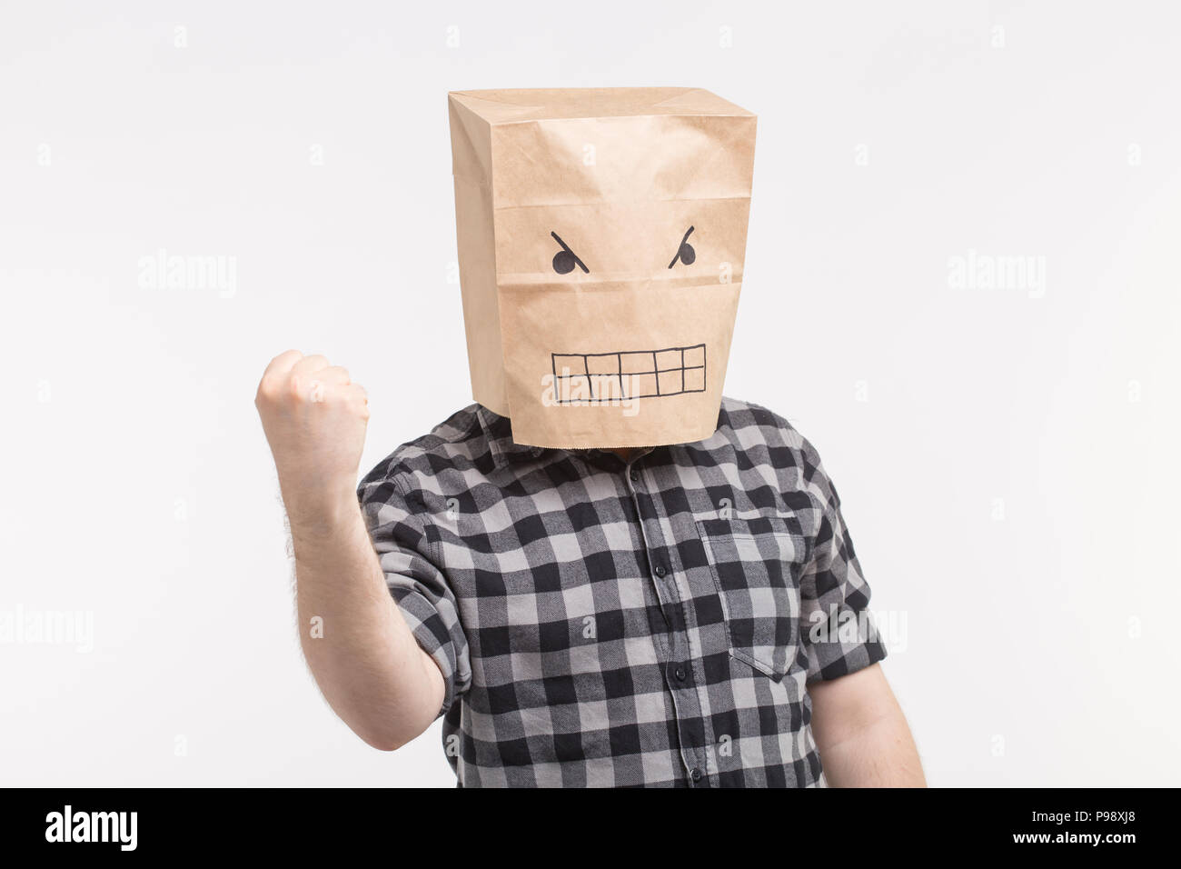 Angry man paper bag mask Stock -