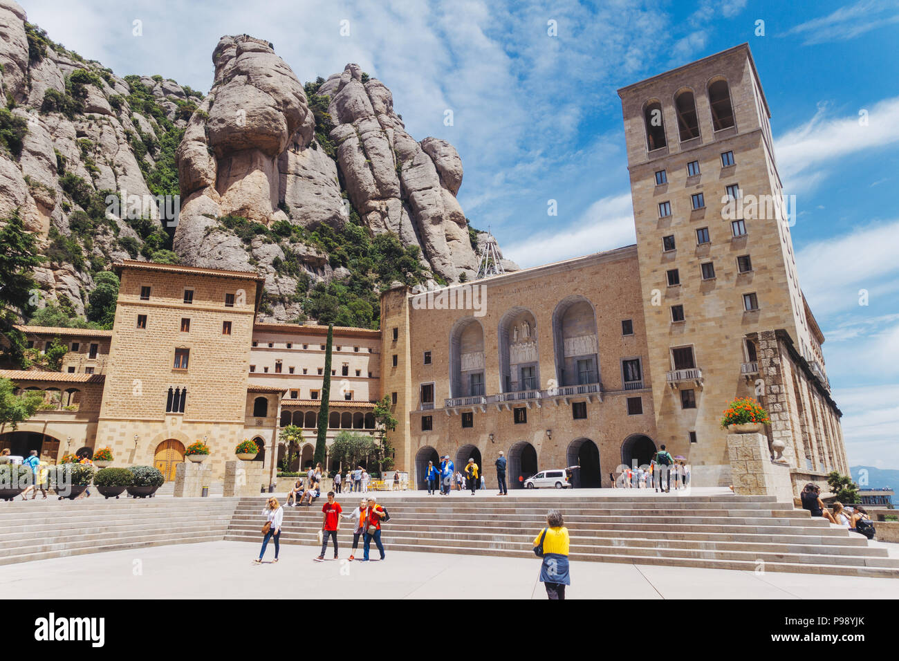 Tourists at the Santa Maria de Montserrat Abbey, a monastery in the Catalan Pre-Coastal Range, north of Barcelona Stock Photo