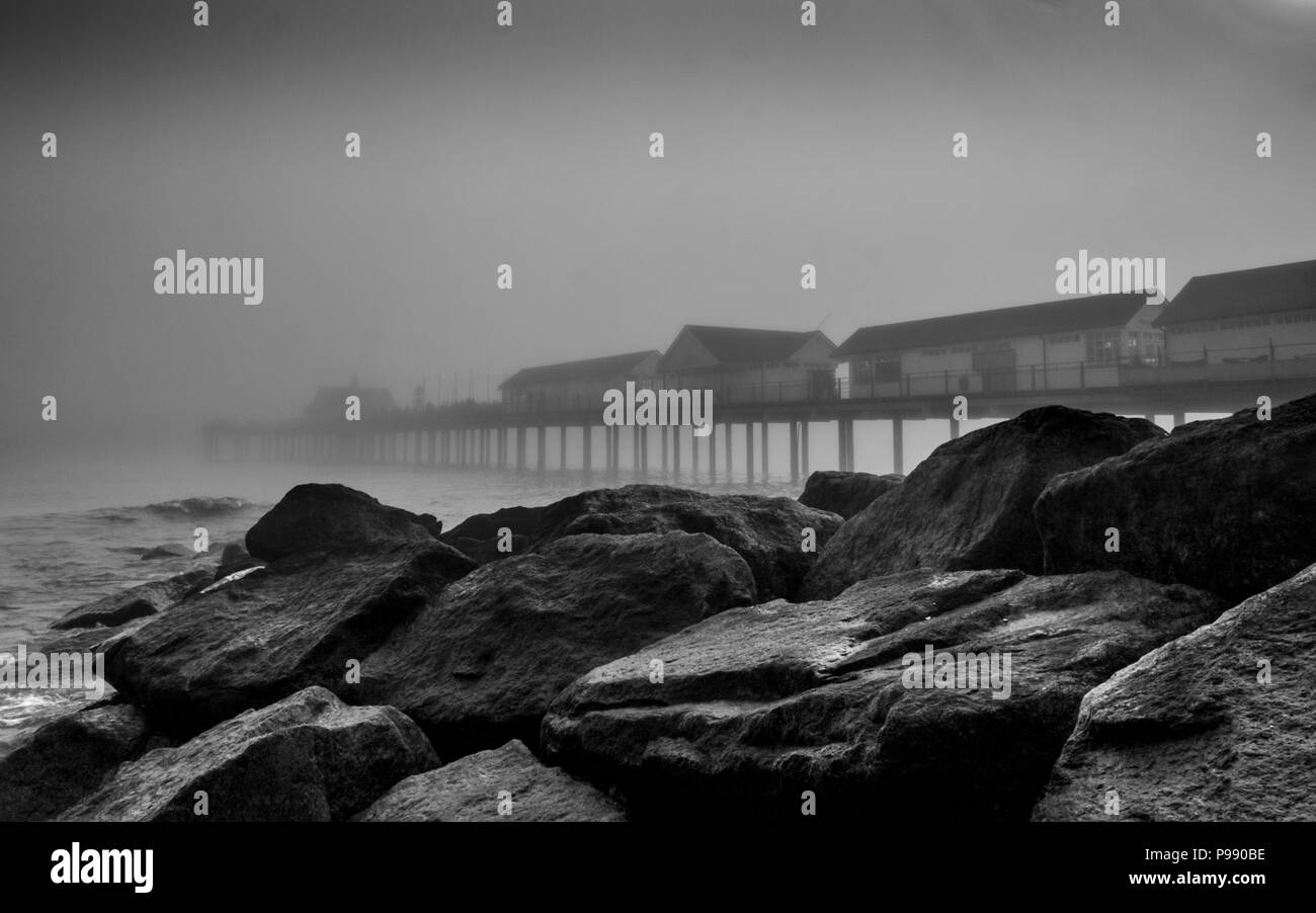 Southwold pier in a summer sea fog Stock Photo