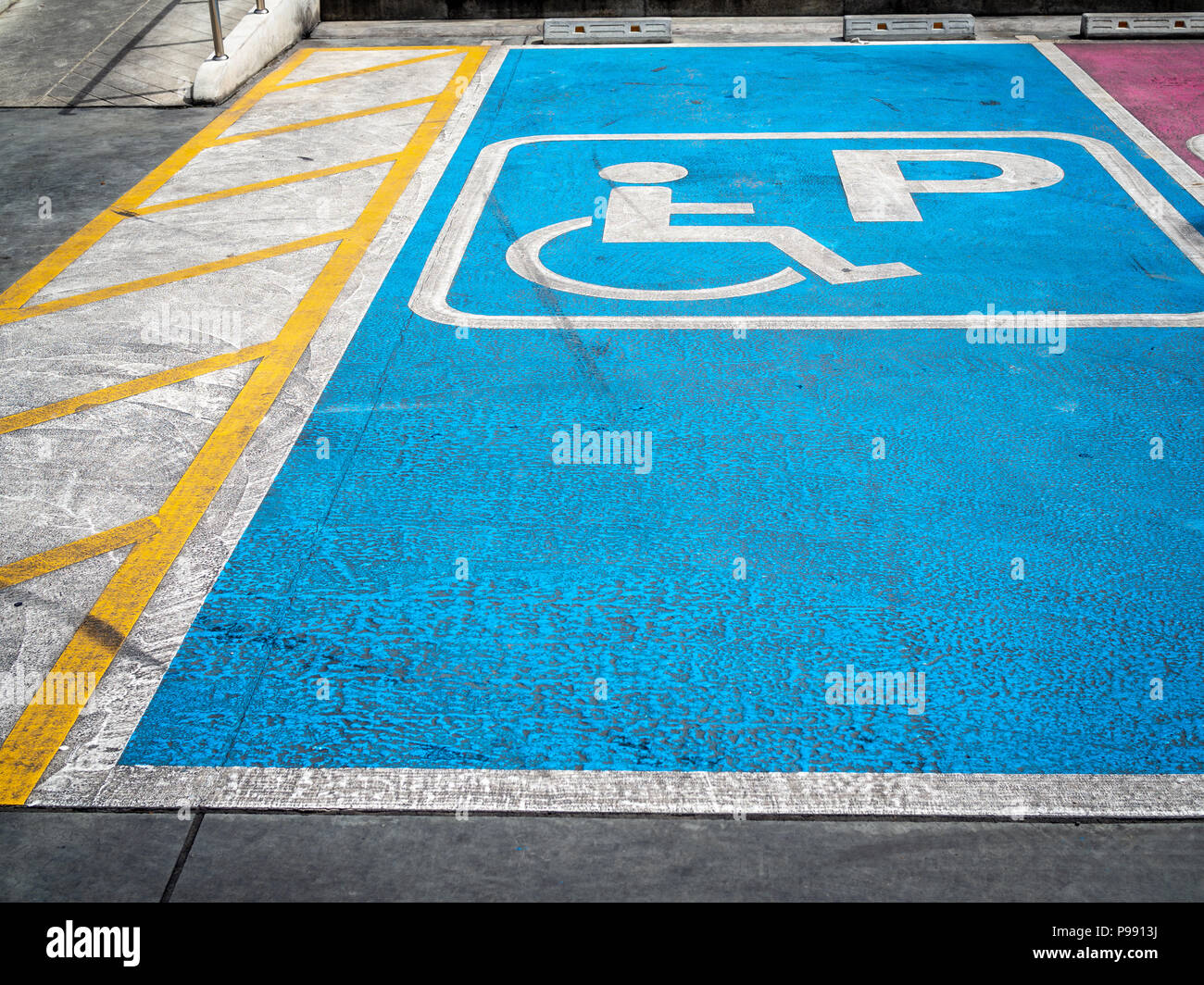 Disabled handicap parking space reserved for handicapped Stock Photo
