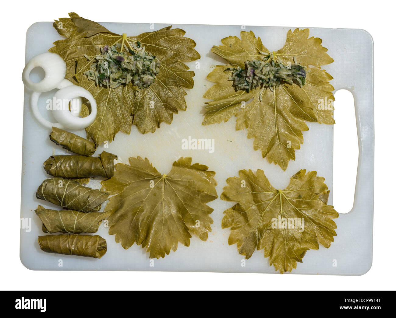 Preparation of stuffed grape leaves with rice Stock Photo Alamy