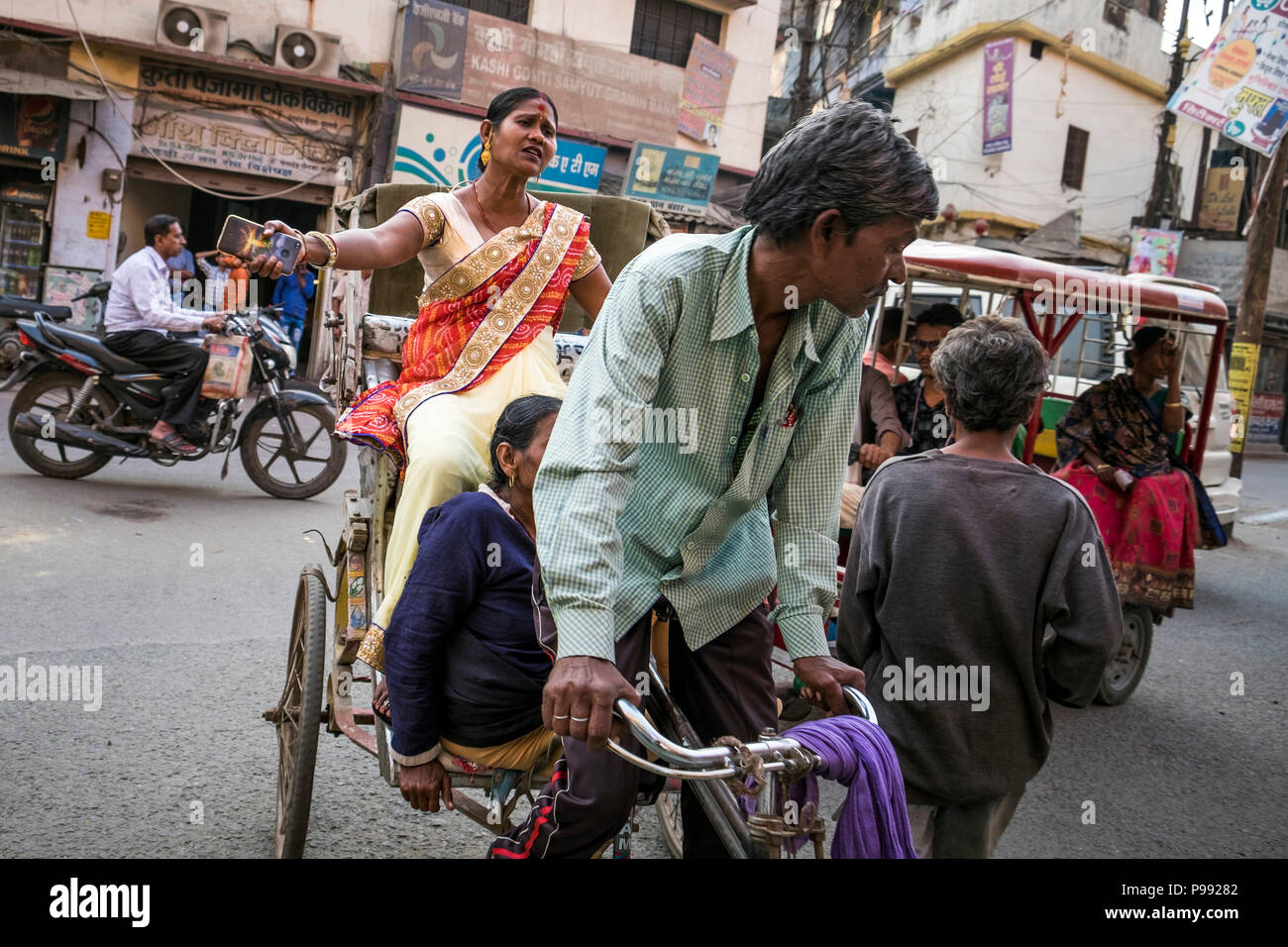 Varanasi Rickshaws Indian folk at rickshaw hi-res stock photography and images - Alamy