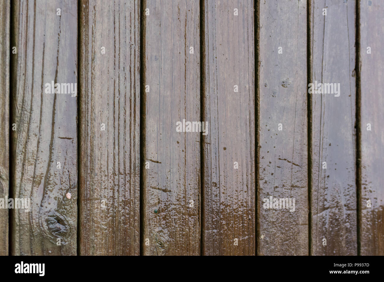 Wooden deck being rained on Stock Photo