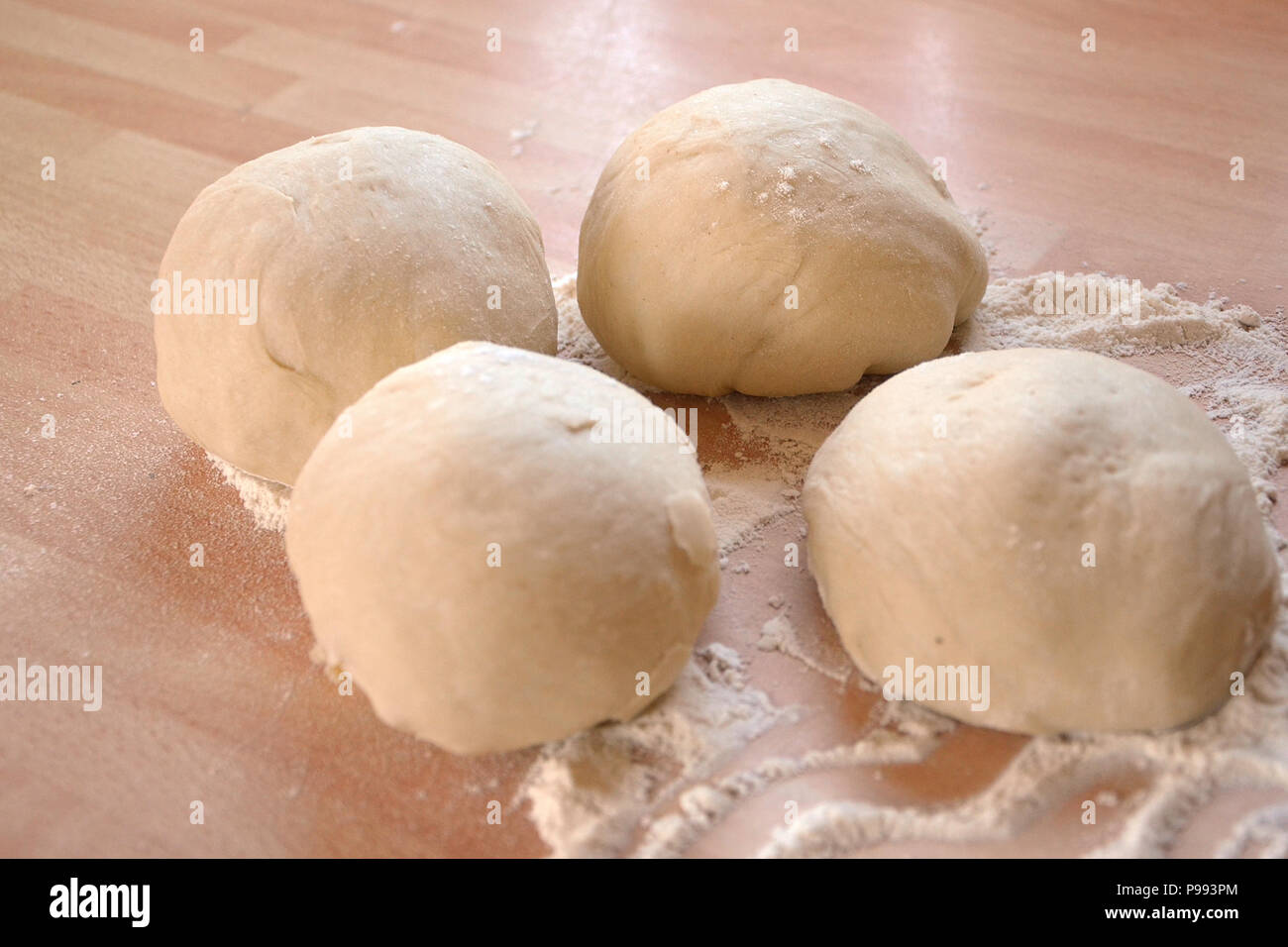 Pizza bread dough balls proving Stock Photo