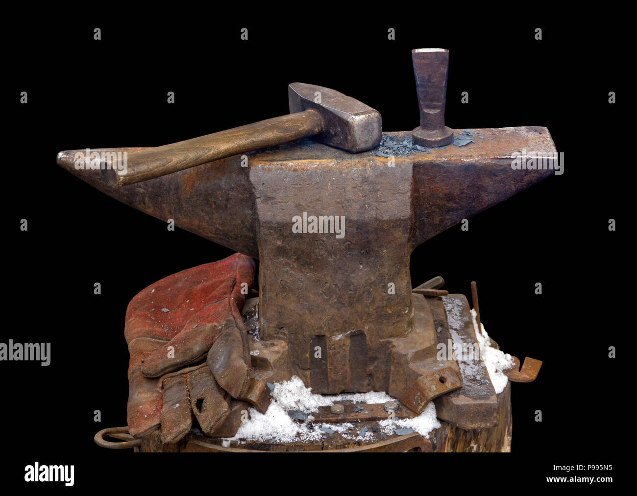 old used anvil and hammer in black back Stock Photo