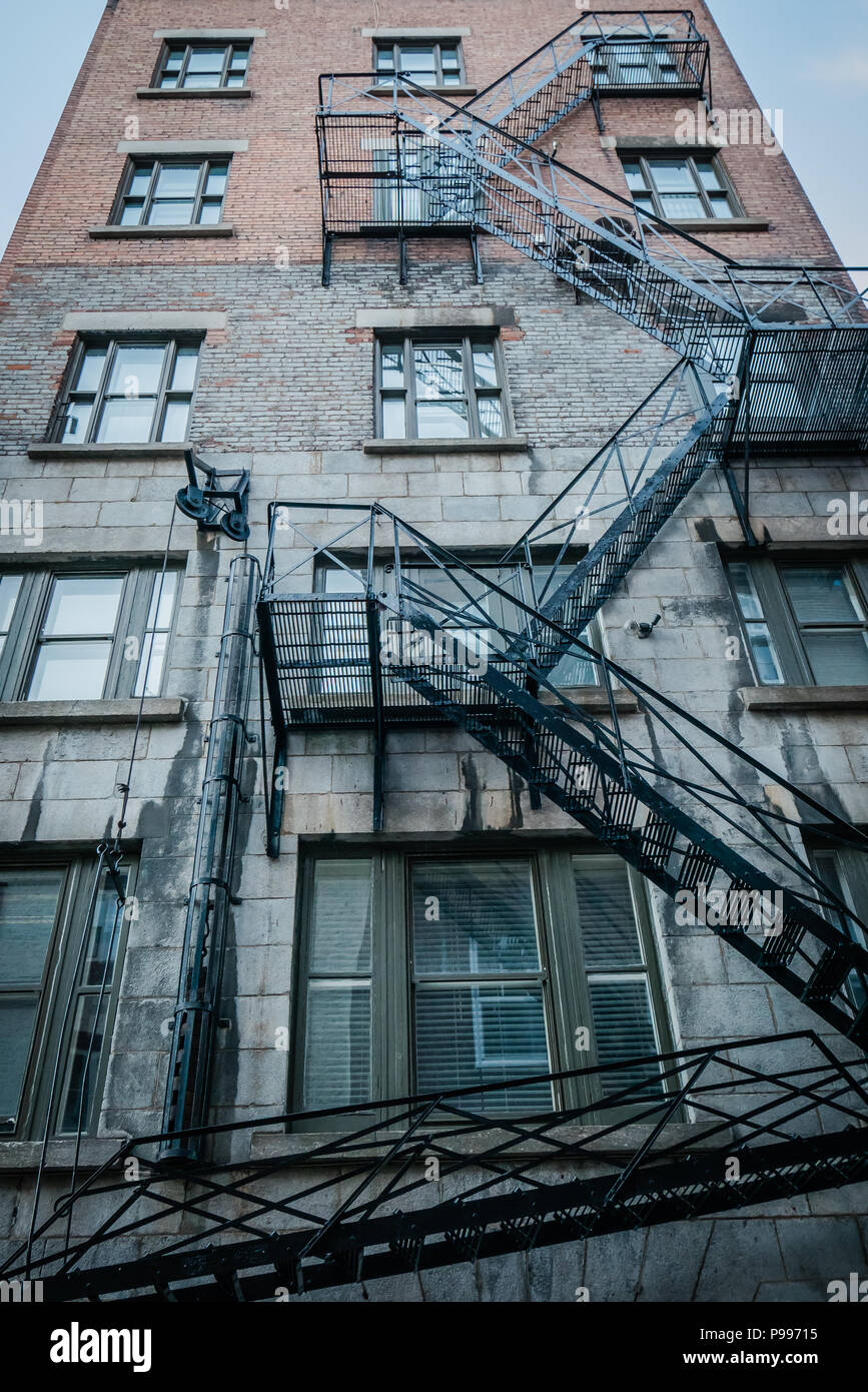 black metal stairs outside of a building Stock Photo