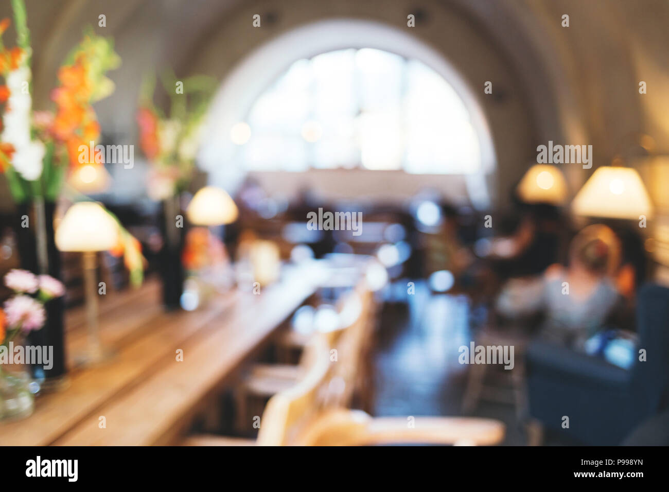 Blurred background with interior of cafeteria. Bokeh. Stock Photo