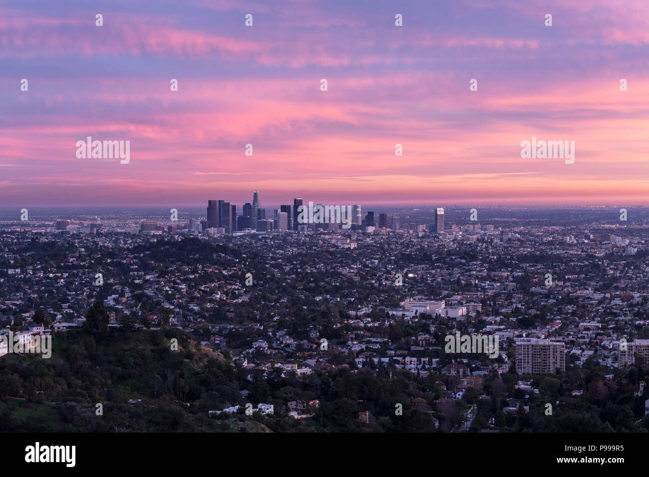 Dusk view of downtown Los Angeles California from Griffith Park in the Santa Monica Mountains. Stock Photo