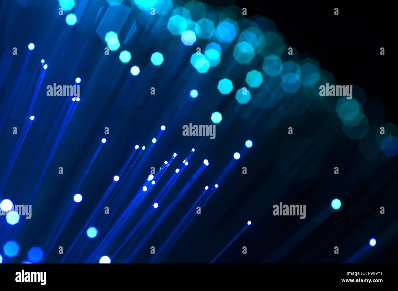 Fiber optics in blue, close up with bokeh Stock Photo - Alamy