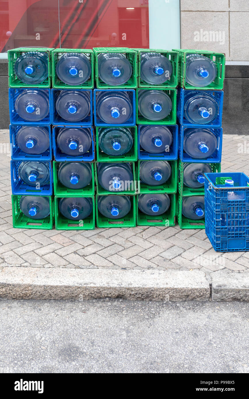 Stack of Filtered Bottled Water in Crates Delivery Stock Photo