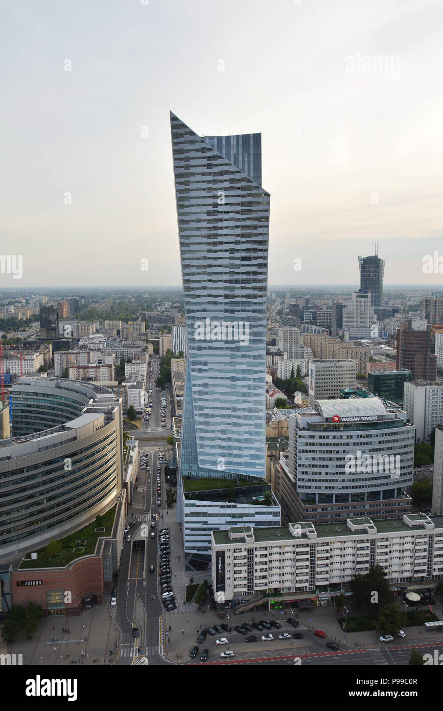 https://c8.alamy.com/comp/P99C0R/warsaw-poland-june-27-2018-view-from-above-and-urban-skyline-with-skyscrapers-hotels-and-office-with-commercial-buildings-at-sunset-in-warsaw-d-P99C0R.jpg