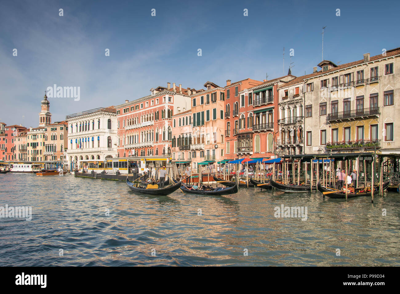 Europe, Italy, Veneto, Venice. Tourists sightseeing Canale Grande (Grand Canal) in Venice near Palazzo Sant Angelo and Palazzo Barocci. Stock Photo