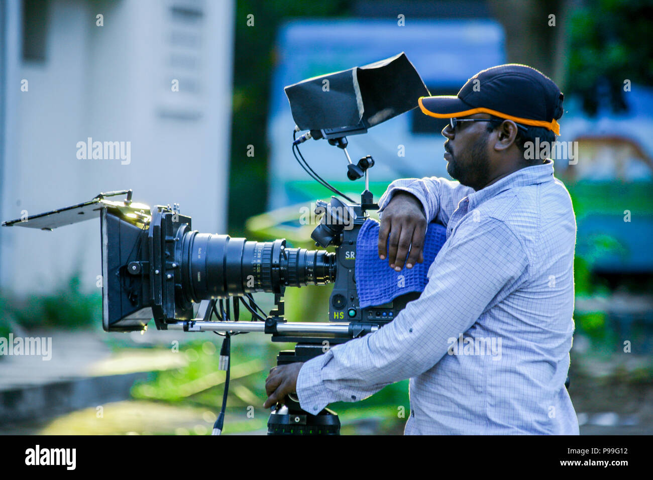 cameraman shooting the film scene with camera in film studio Stock