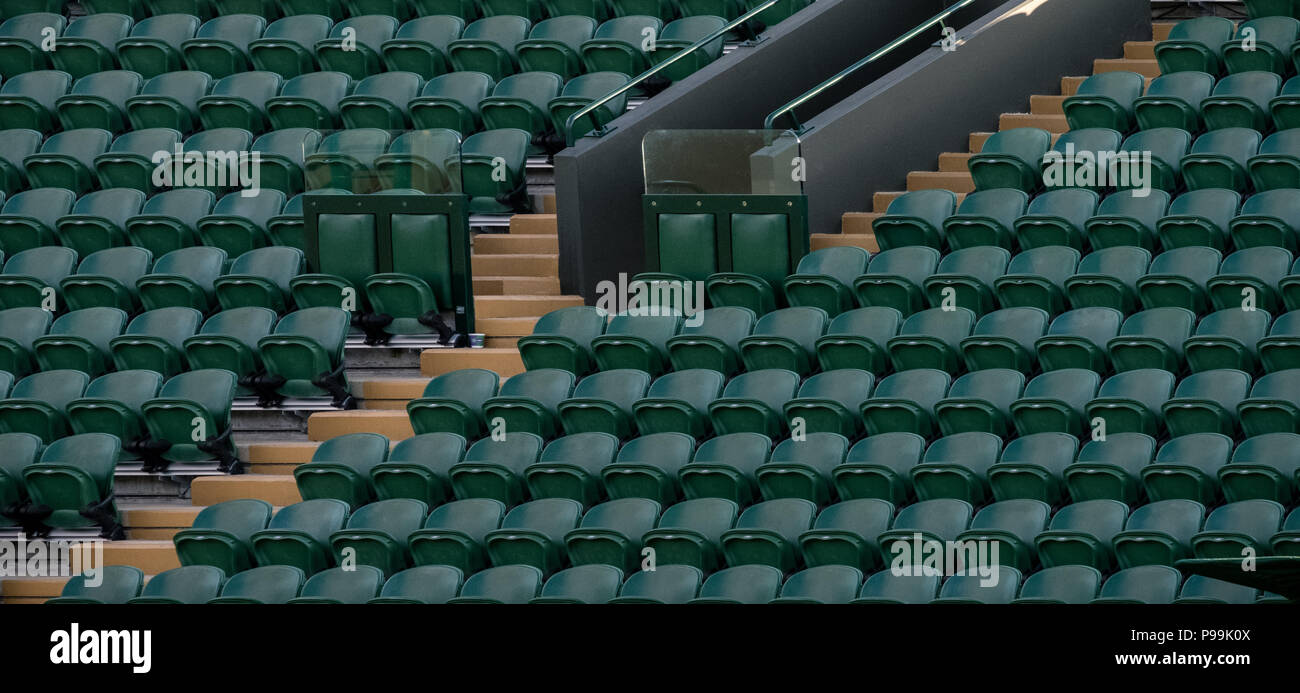 Wimbledon London, July 2018. Rows of empty green spectators' seats at Wimbledon All England Lawn Tennis Club. Stock Photo