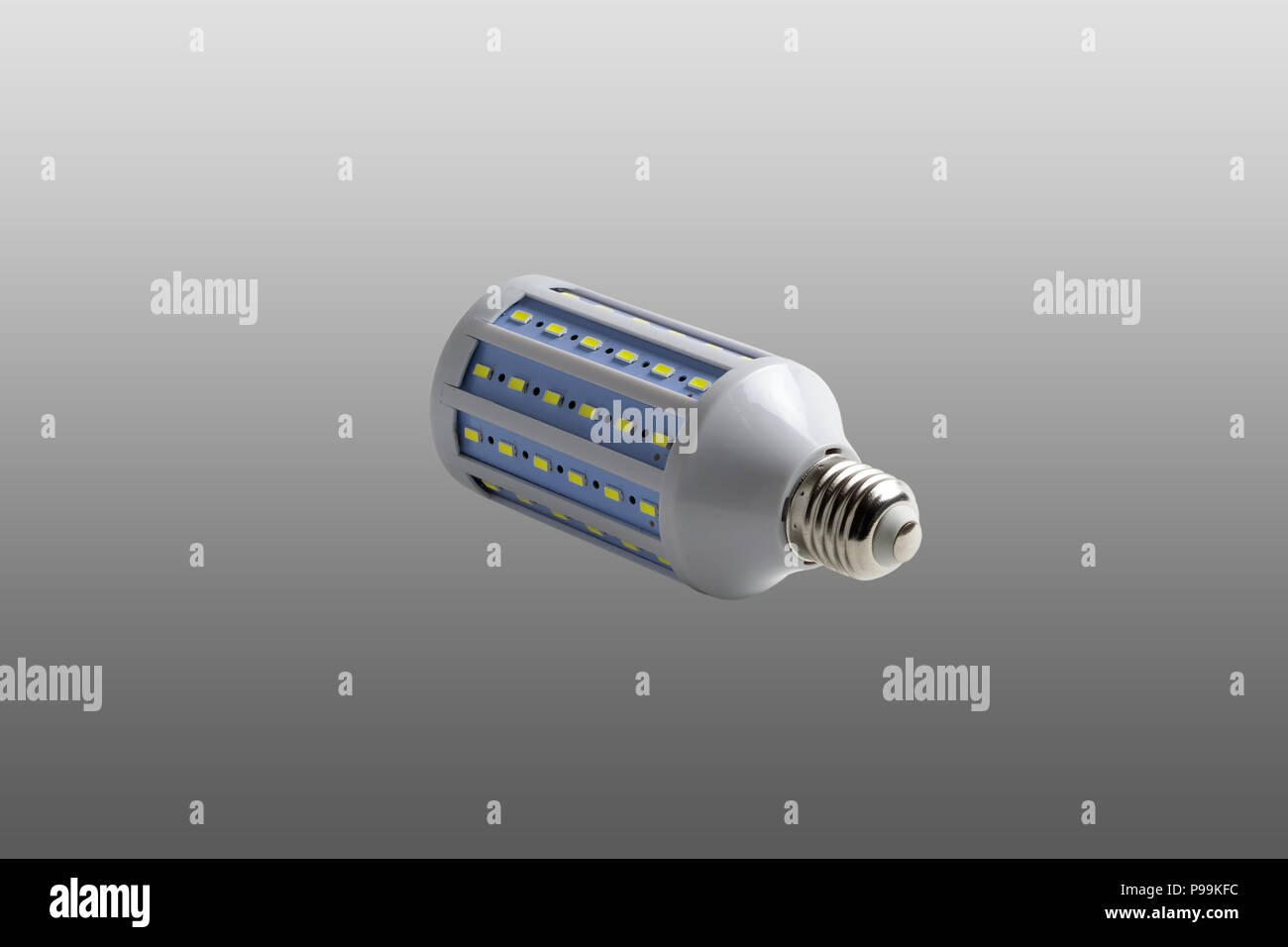 LED corn lamp. Close-up. Isolated on a gray background. Stock Photo