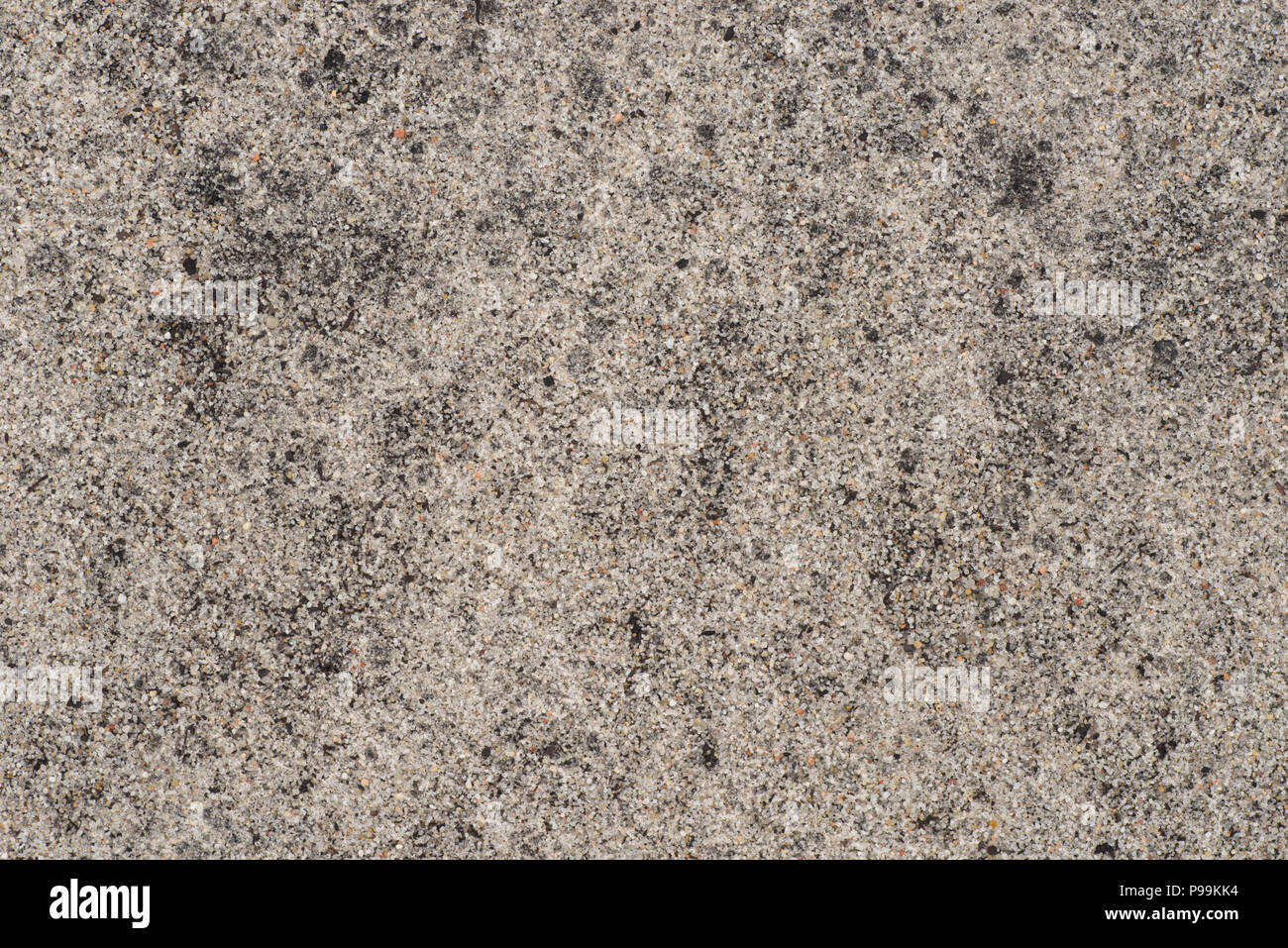 sandy soil ground background texture closeup Stock Photo