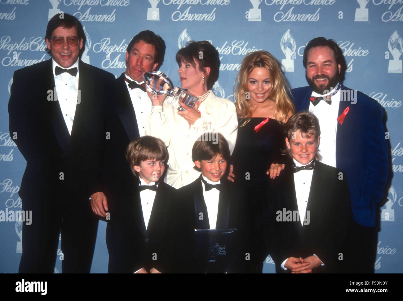 BEVERLY HILLS, CA - MARCH 17: (L-R) Actors Earl Hindman, Tim Allen, Patricia Richardson, Pamela Anderson, Richard Kam (back row) and Taran Noah Smith, Jonathan Taylor Thomas and Zachery Ty Bryan (front)attends the 18th Annual People's Choice Awards on March 17, 1992 at Universal Studios in Universal City, California. Photo by Barry King/Alamy Stock Photo Stock Photo