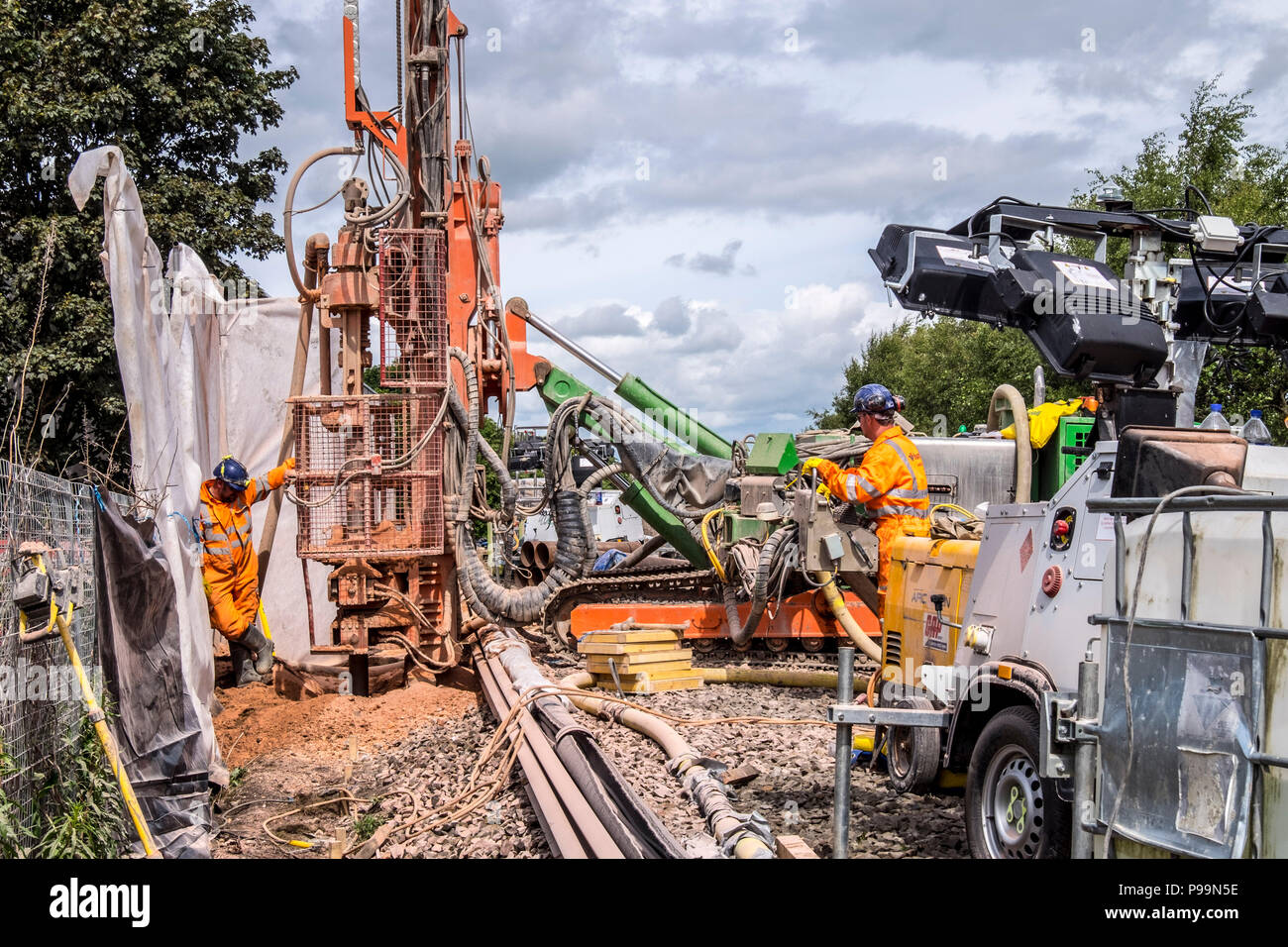 Railway Construction workers Stock Photo - Alamy