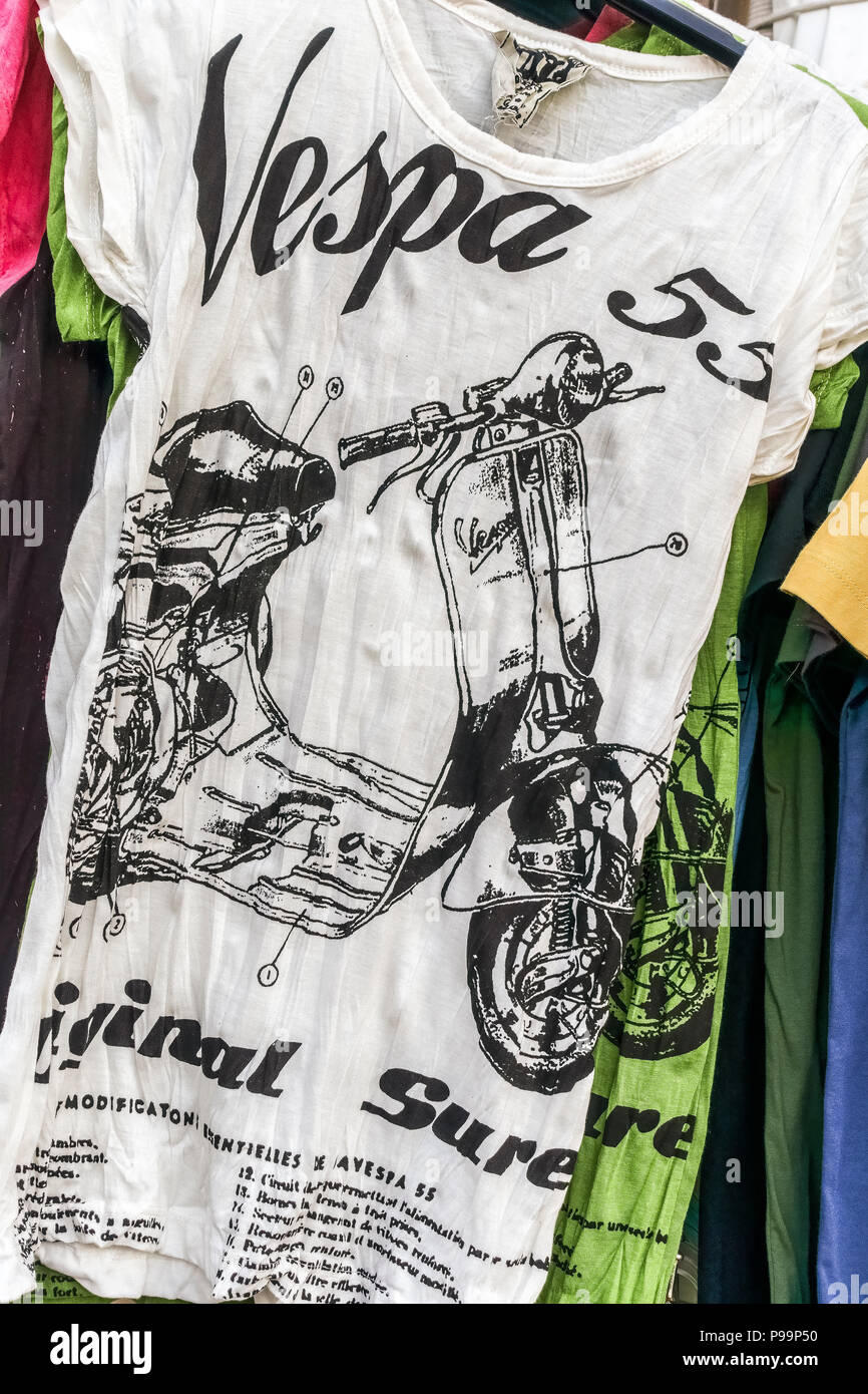 Vespa 55 white T shirt on display for sale. Fashion casual clothes. Close up, detail. Stock Photo