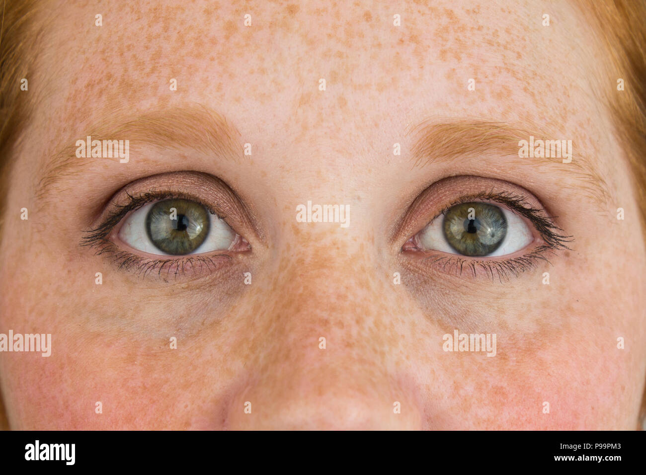 Close up of read head's freckles Stock Photo