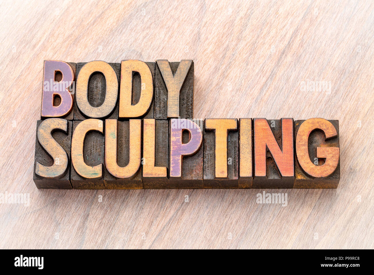 body sculpting - word abstract in vintage letterpress wood type Stock Photo