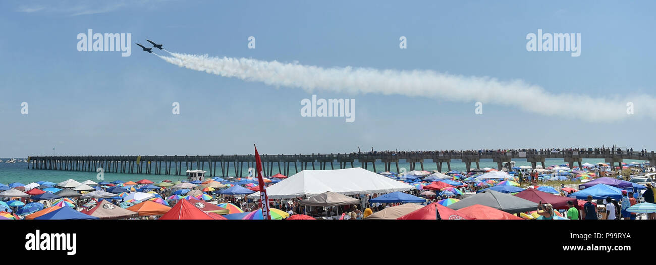 180714-N-ZC358-1337  PENSACOLA BEACH, Fla. (July 14, 2018) The U.S. Navy Flight Demonstration Squadron, the Blue Angels, Solo pilots perform the Section High Alpha at the 2018 Pensacola Beach Air Show. The Blue Angels are scheduled to perform more than 60 demonstrations at more than 30 locations across the U.S. and Canada in 2018. (U.S. Navy photo by Mass Communication Specialist 2nd Class Jess Gray/Released) Stock Photo