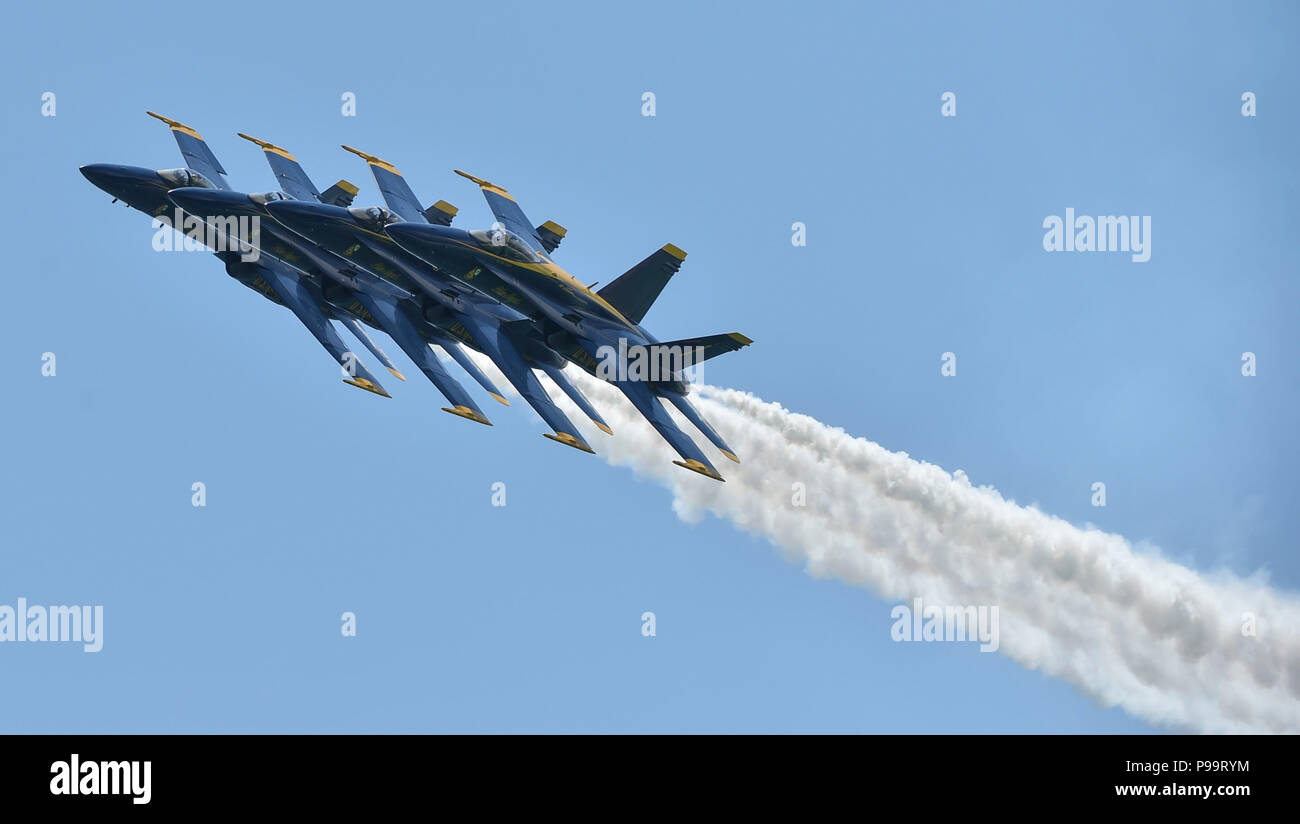 180713-N-ZC358-1222 PENSACOLA BEACH, Fla. (July 13, 2018)   The U.S. Navy Flight Demonstration Squadron, the Blue Angels, Diamond pilots perform the Echelon Parade at the 2018 Pensacola Beach Air Show. The Blue Angels are scheduled to perform more than 60 demonstrations at more than 30 locations across the U.S. and Canada in 2018. (U.S. Navy photo by Mass Communication Specialist 2nd Class Jess Gray/Released) Stock Photo