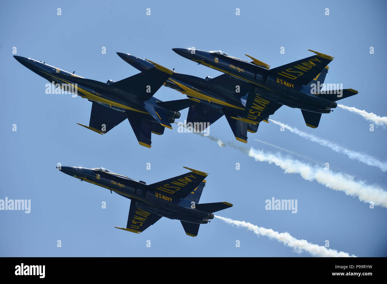180713-N-ZC358-1195 PENSACOLA BEACH, Fla. (July 13, 2018)   The U.S. Navy flight demonstration squadron, the Blue Angels, perform the Double Farvel during the 2018 Pensacola Beach Air Show. The Blue Angels are scheduled to perform more than 60 demonstrations at more than 30 locations across the U.S. and Canada in 2018. (U.S. Navy photo by Mass Communication Specialist 2nd Class Jess Gray/Released Stock Photo
