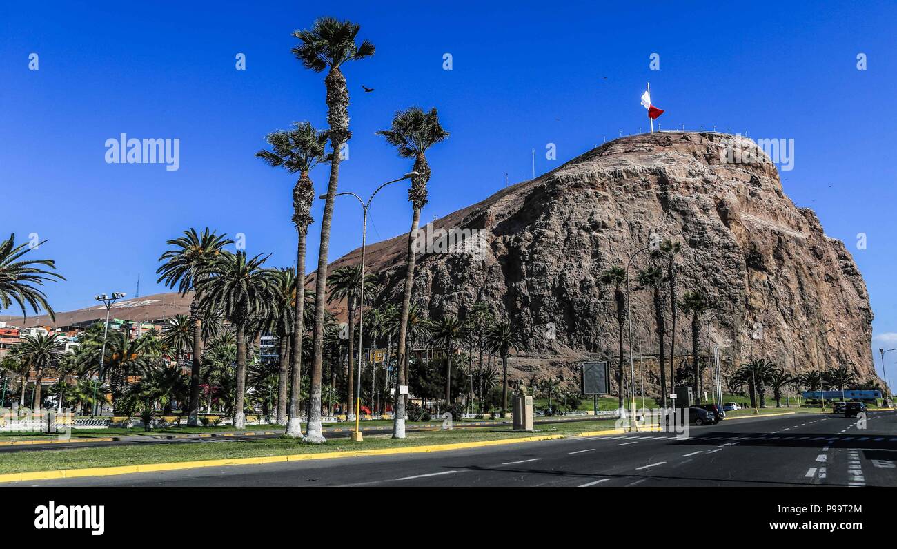 Beach of Arica Chile. Morro de Arica, Chile. Arica is a port city in northern Chile known for its ideal beaches for surfing. Stock Photo