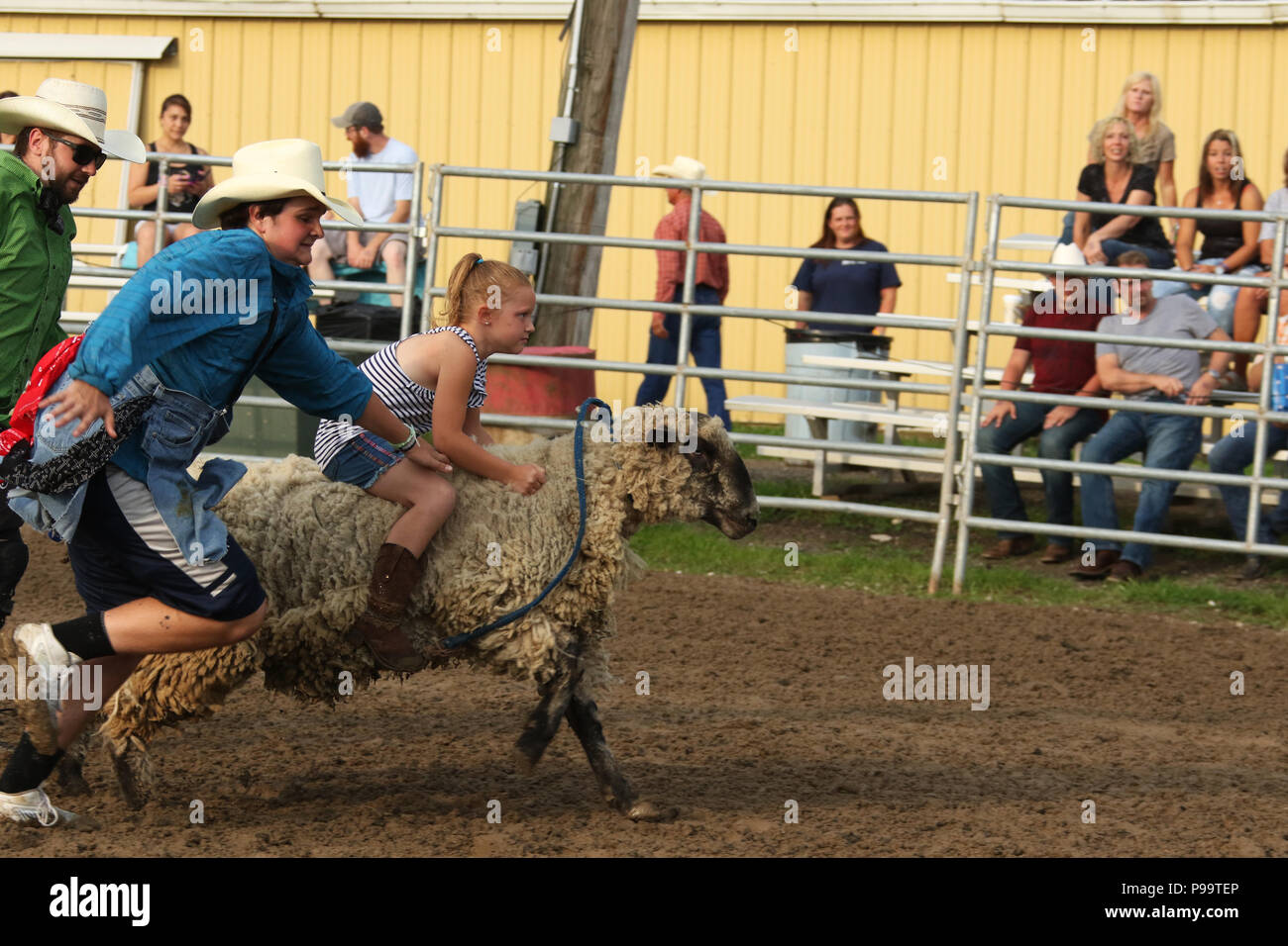 Cowgirl riding into town hi-res stock photography and images - Alamy