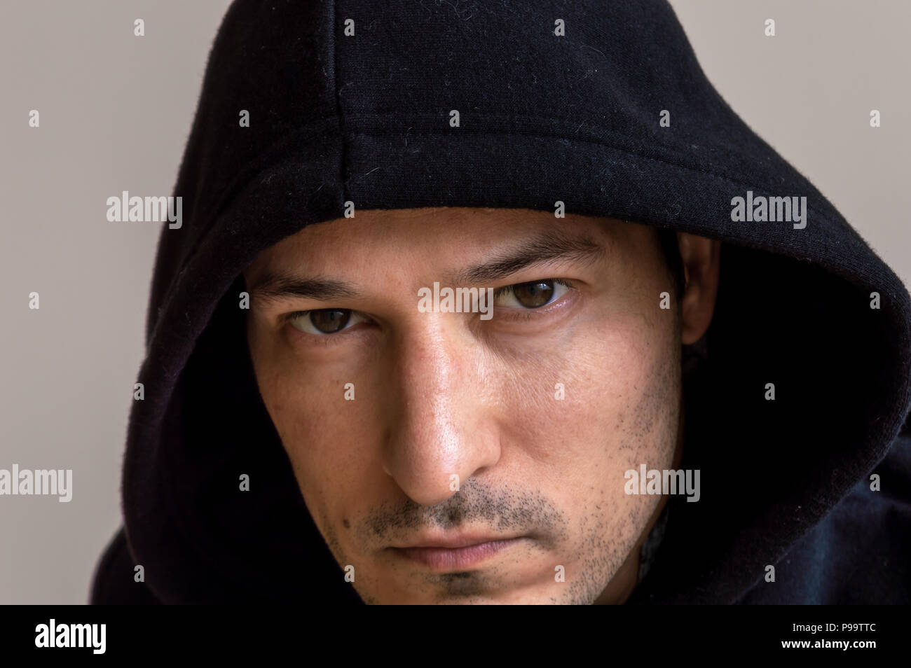 Portrait of an young man with hood Stock Photo
