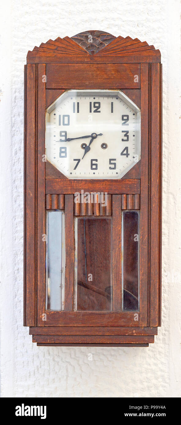 Wooden grandfather clock with pendulum at wall Stock Photo Alamy