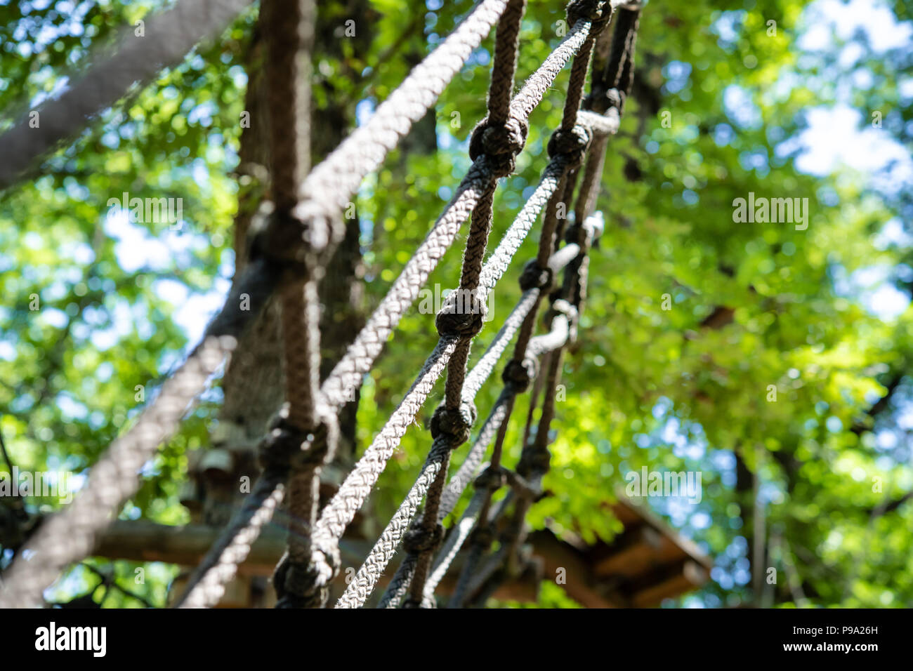 Detail of mesh low angle view of obstacle in the path of adventure playground Stock Photo