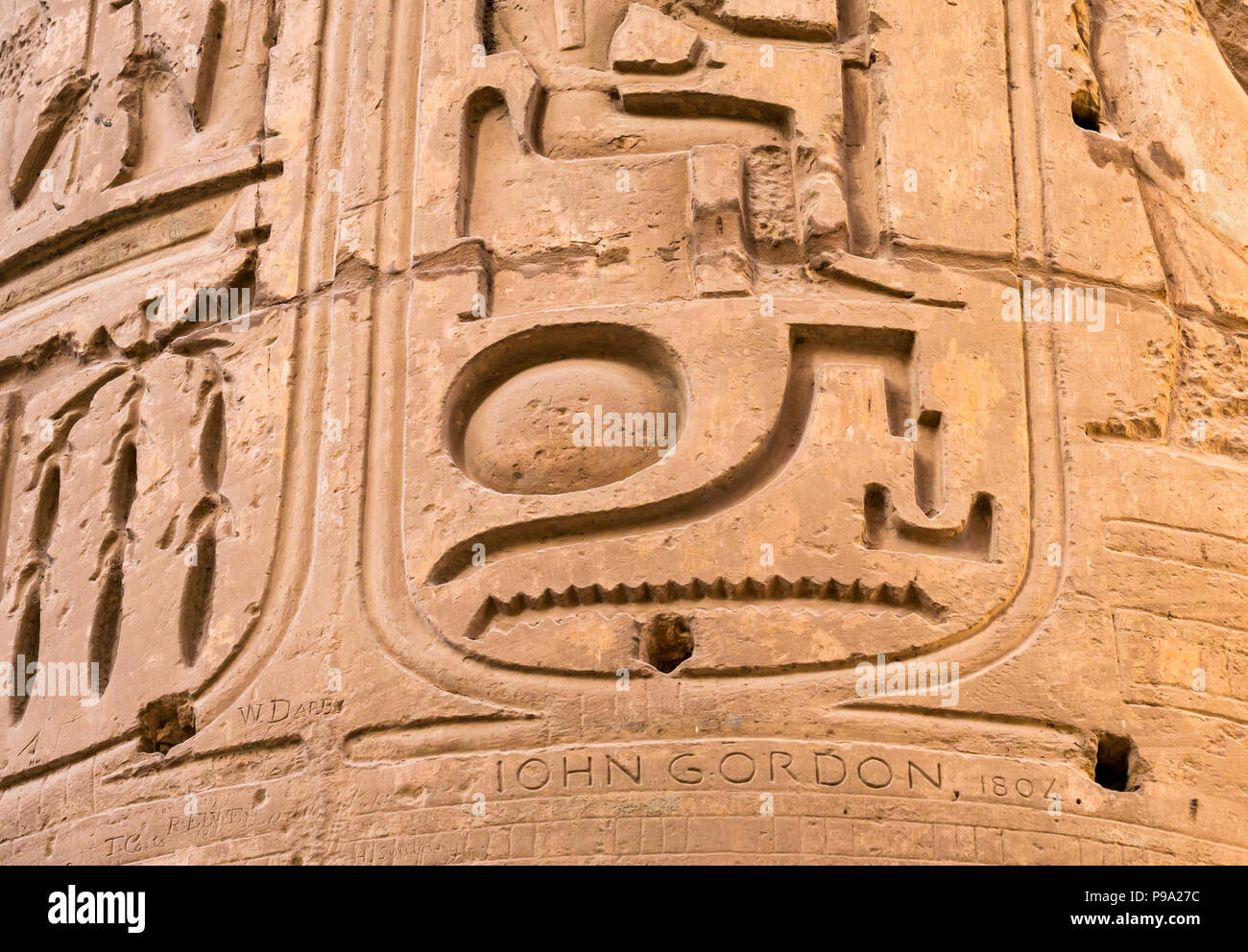 Cartouche hieroglyph on column with Victorian graffiti, great hypostyle hall, precinct of Amun Ra, Karnak Temple. Luxor, Egypt, Africa Stock Photo